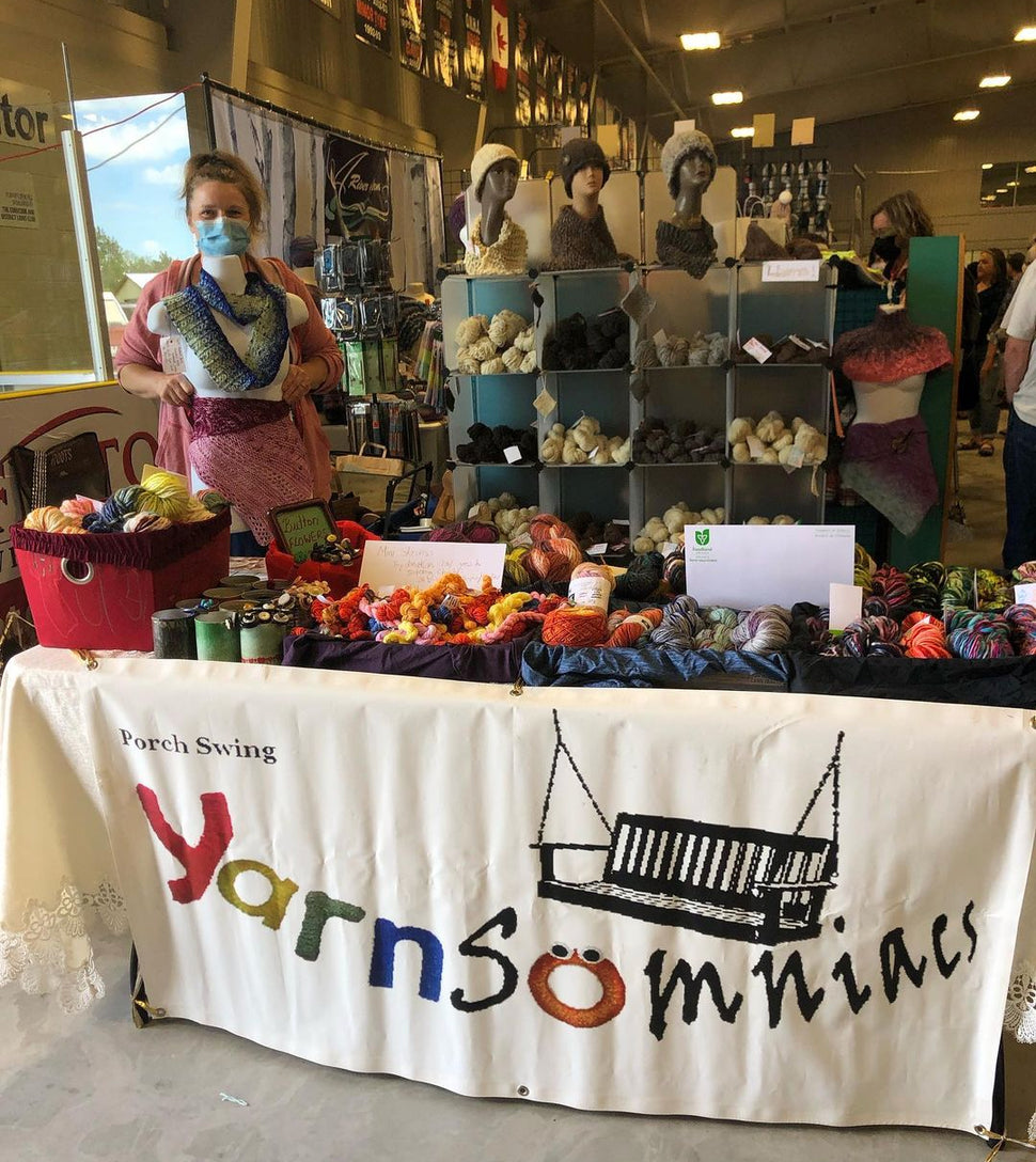 handspun yarn display table at a fair